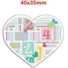 A heart-shaped piece of flatback resin craft embellishment with the number 24 and other decorative elements.