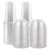 A stack of clear disposable plastic cups with lids for cold drinks.