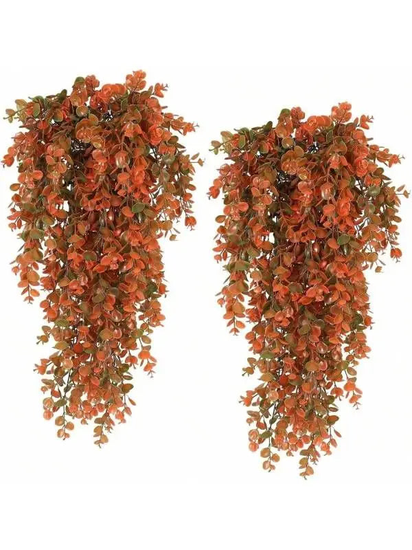 Artificial eucalyptus hanging plants in shades of orange and green for home decor