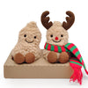 A pair of Christmas plush toys featuring reindeer heads with antlers and a festive scarf.