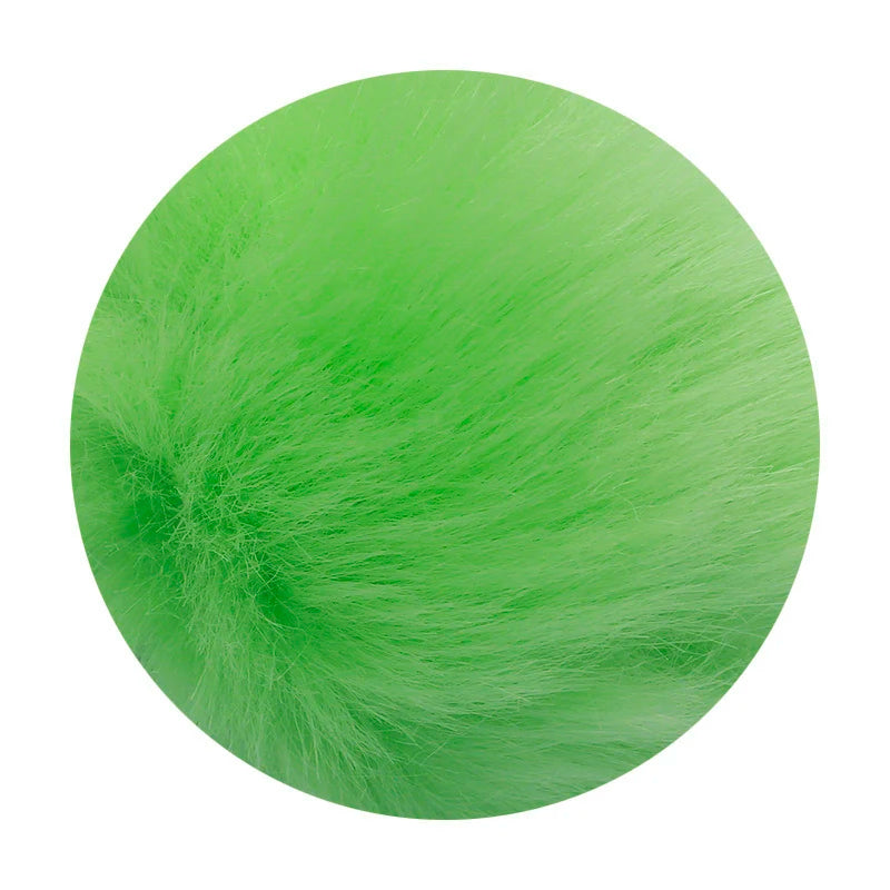 A spherical pom pom made of bright lime green faux fur with a silver chain.