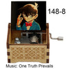 A wooden music box featuring an anime figure of a character, labeled 148-8, with the music title One Truth Prevails.
