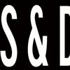 Black text sign reading SNACKS & DRINKS.