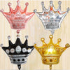 Three foil crown shaped balloons in pink silver and gold colors for birthday and party decoration
