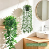 A set of four realistic hanging artificial ivy vines used for bathroom decor and indoor foliage.