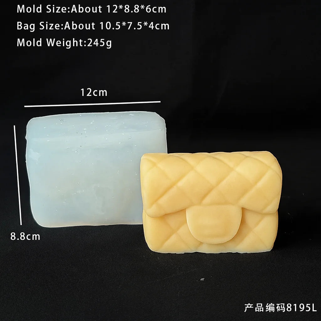 A light blue silicone mold for making candles or crafts, next to a yellow silicone handbag mold.