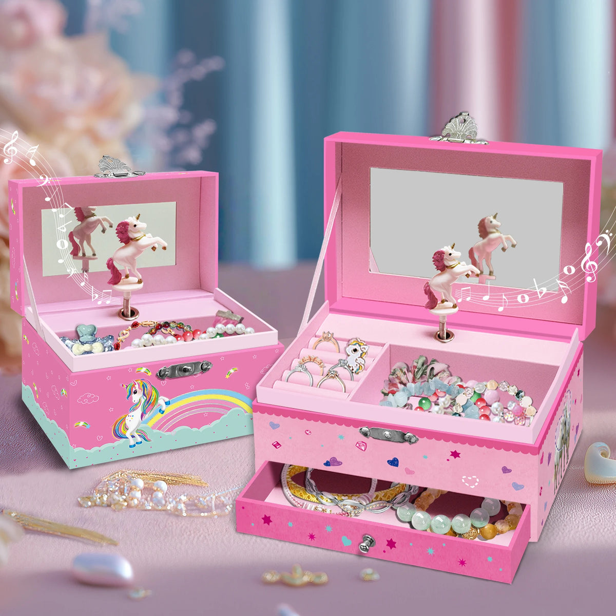 A pink jewelry box for unicorn music featuring a rotating dancer figurine and various sparkly accessories.