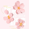 Pink magnetic cherry blossom sealing clips with five petals shown in a close-up view