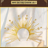 A gold celestial halo headband with radiating sun rays and star accents displayed on a white chair.