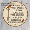 Señal de jardín de aluminio rústico con un petirrojo en un tenedor de jardín, con texto sobre recibir una señal del cielo.