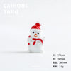 A white resin snowman figurine with a red hat and scarf, displayed against a white background.