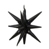 A black star burst foil balloon with sharp points.