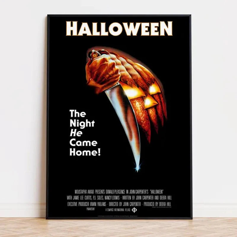 Poster art for Halloween featuring a close-up of Michael Myers with the text The Night He Came Home!