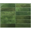 A rectangular panel of glossy, dark olive green 3D peel and stick backsplash tiles.