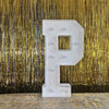 A large white marquee letter P with a mirrored insert displayed against a shimmering gold curtain backdrop.