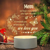 A warm glow night light featuring a heart design with text that reads We hope every time you light this up it reminds you how