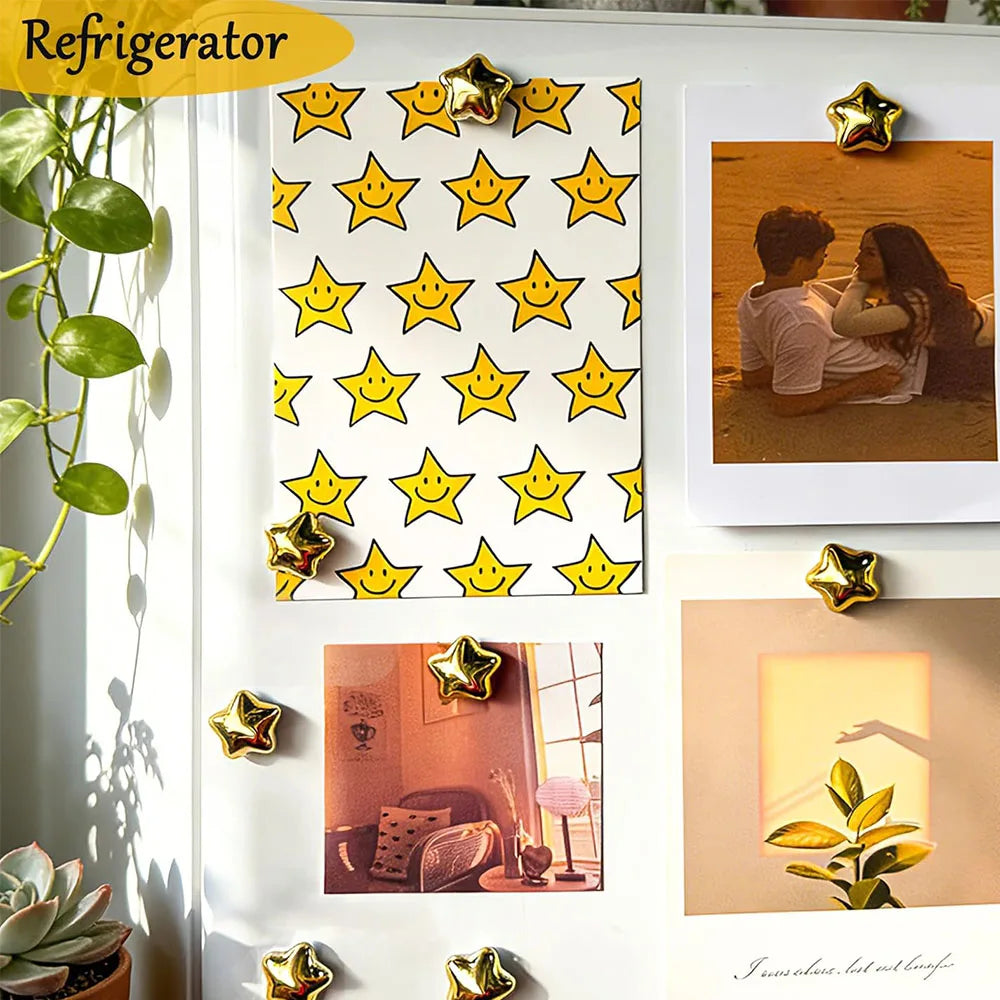 A set of fifteen gold star fridge magnets featuring a yellow and white star pattern.