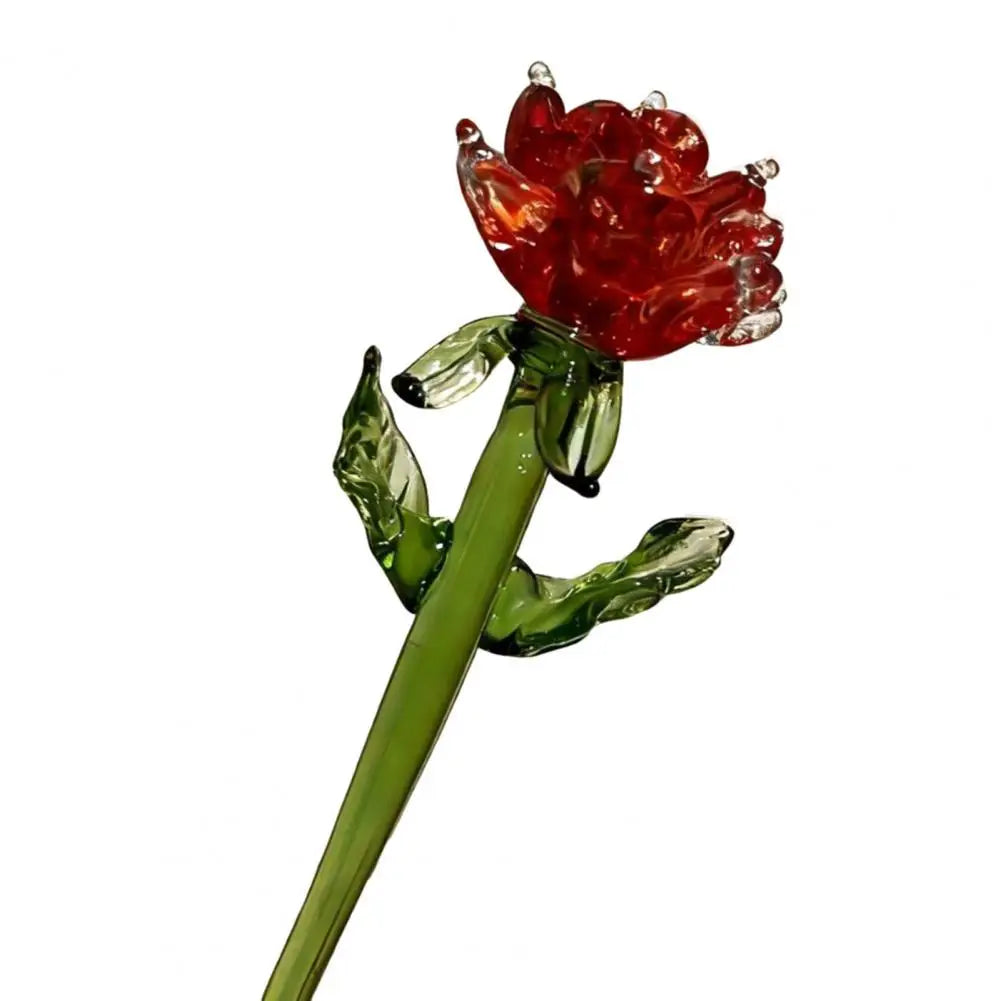 Handcrafted blue glass flower sculpture with a red bloom and green stem
