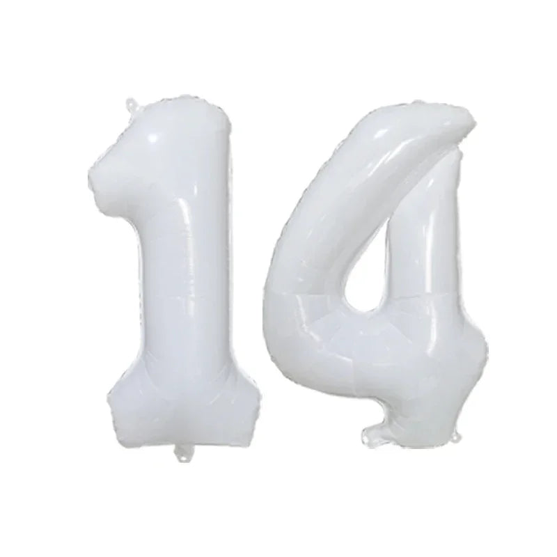 Silver foil number balloons shaped like the number 14