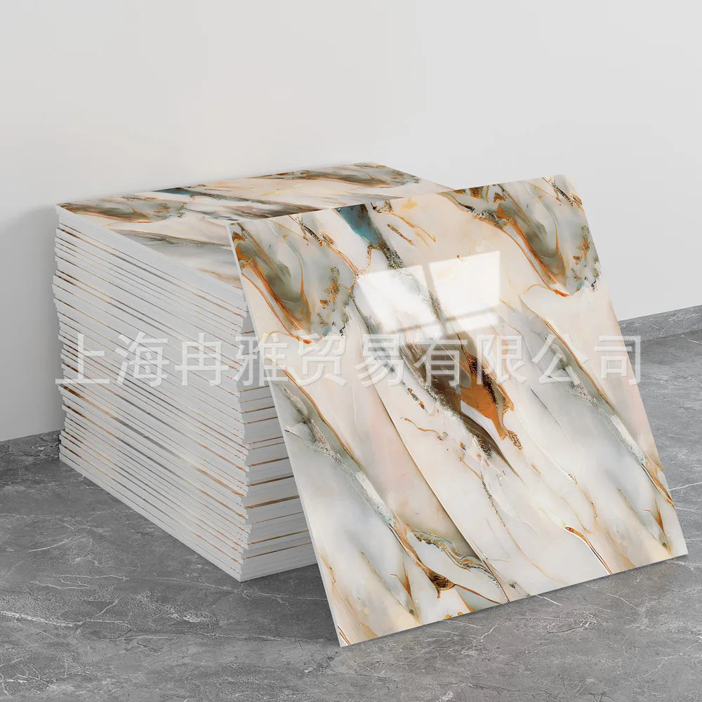 A stack of faux marble 3D self-adhesive wall tiles featuring natural veining in beige, white, and brown tones.
