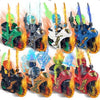 A collection of golden ninja building block figures in various colors and poses.