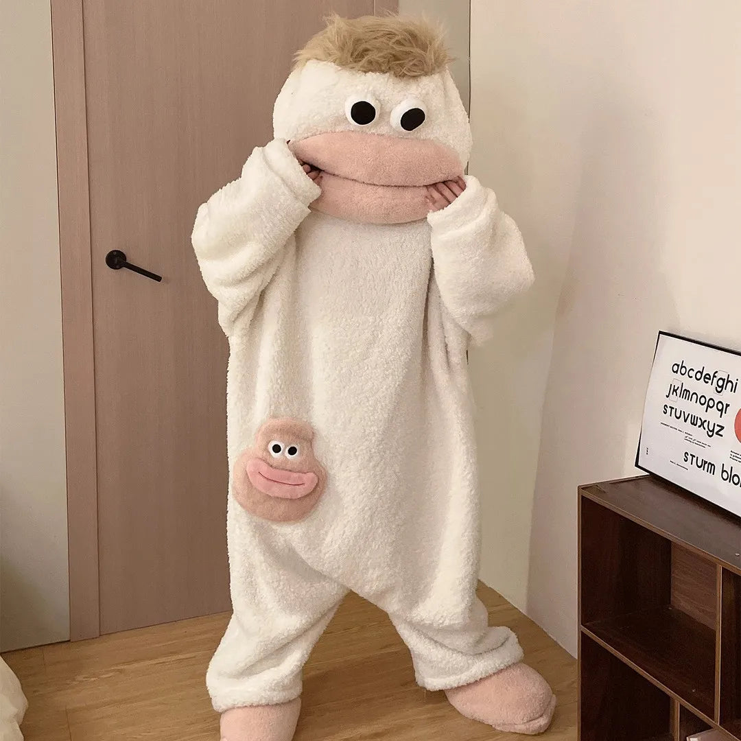 A white, fuzzy monster onesie pajama suit for a baby or toddler.