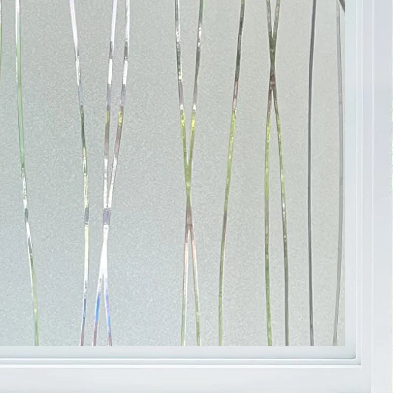 Frosted glass window privacy film with vertical, translucent strips on a white frame.