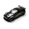 A black remote control car model with a spoiler and yellow accents is shown on a white background.