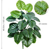 A lush artificial Monstera plant with large green silk leaves shown in a full view and close-up.