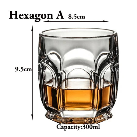 A clear hexagonal whiskey glass with a heavy base, measuring 8.5cm and having a capacity of 300ml.