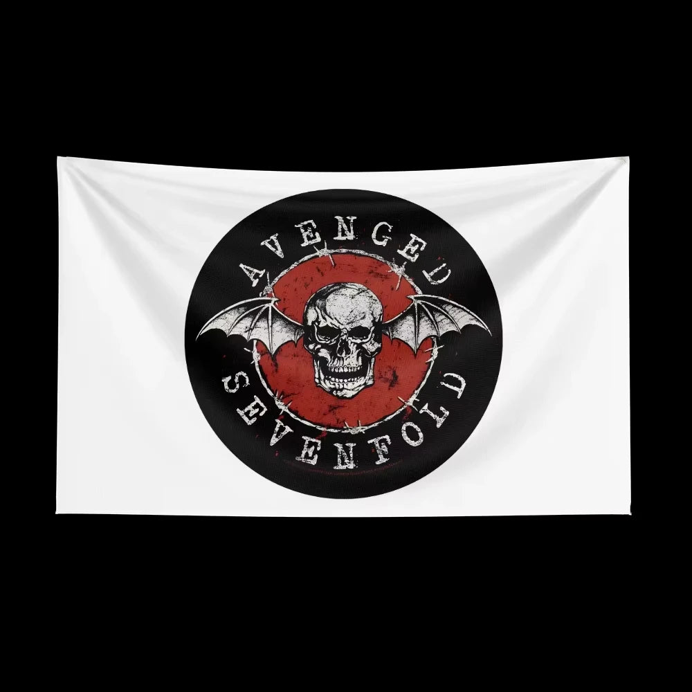 A black and red graphic featuring a skull with bat wings surrounded by the text AVENGED SEVENTFOLD on a white fabric banner.