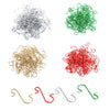 A collection of decorative S-shaped hooks in silver, green, and gold colors.