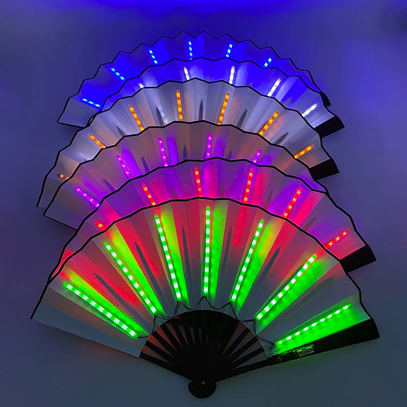 A multi-mode LED party fan displaying a vibrant rainbow of light colors like blue, purple, red, and green.