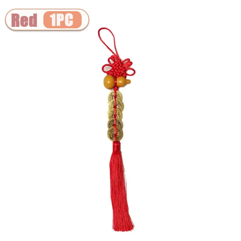 Red traditional Chinese knot pendant featuring a wooden gourd and copper coins.