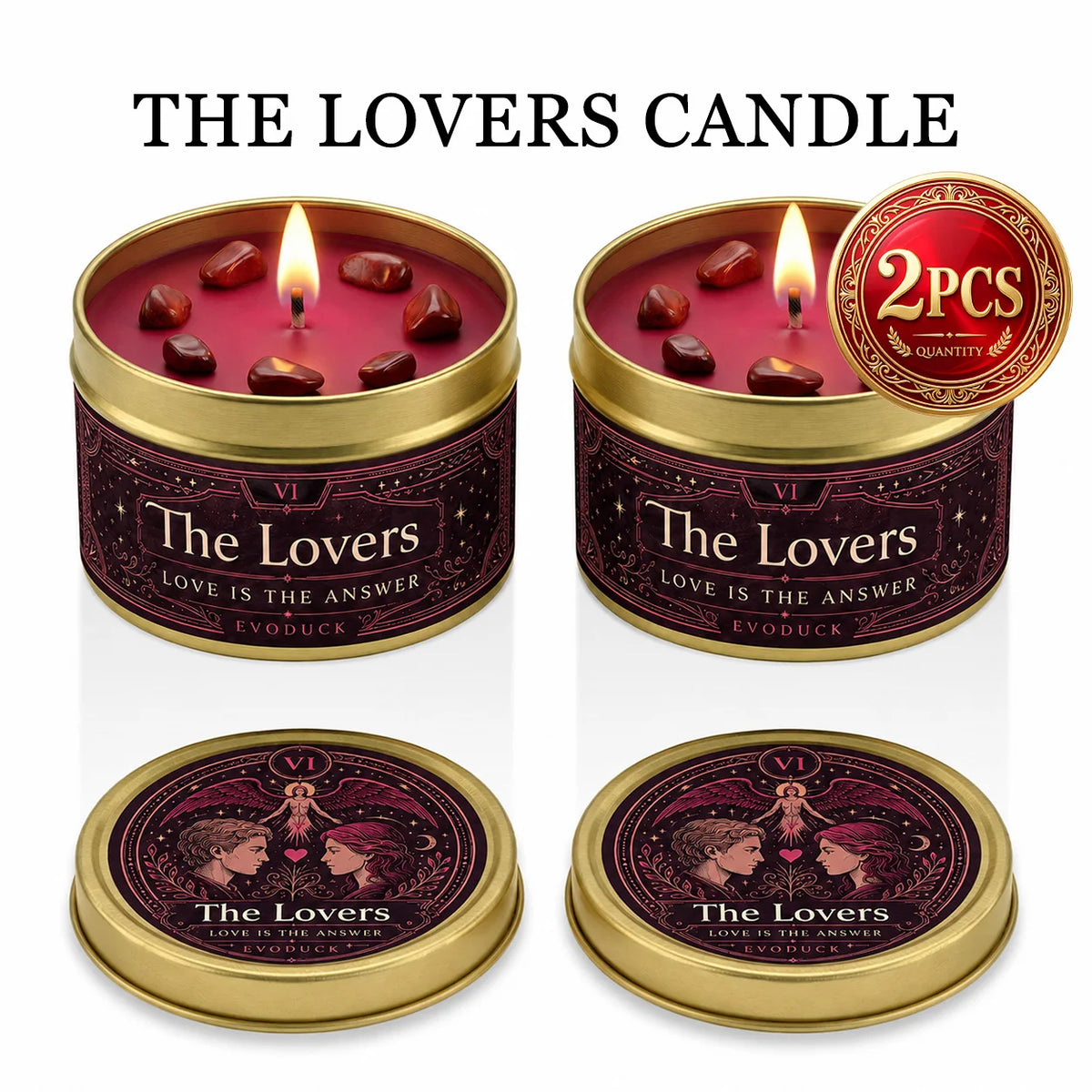 A set of three The Lovers candles in gold tins with dark red wax and floral designs.