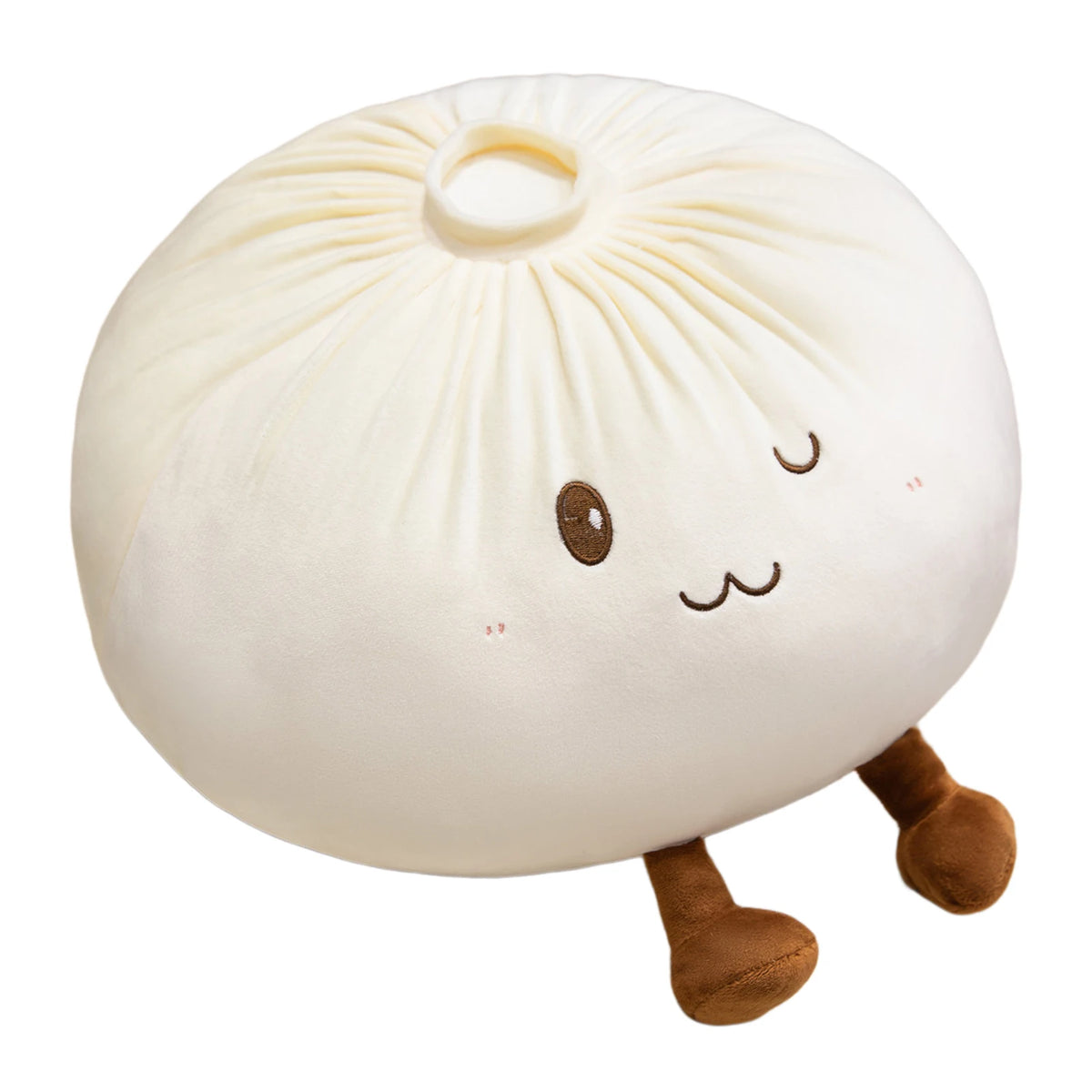 A round, cream-colored plush pillow shaped like a dumpling with small brown ears.