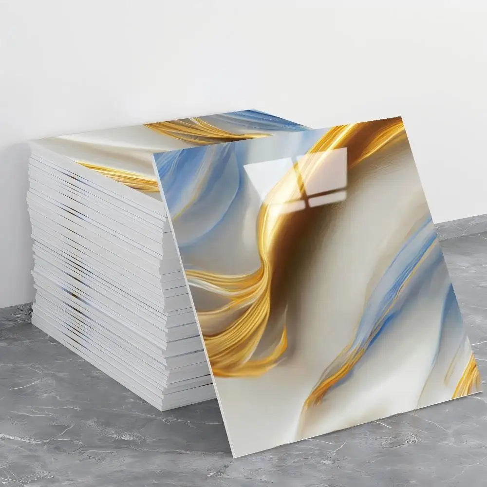 A stack of self-adhesive marble tile stickers featuring abstract gold and blue marble patterns.