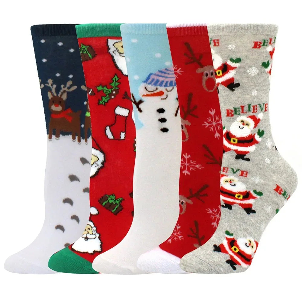 A stack of five Christmas women's socks featuring reindeer, snowmen, and festive holiday patterns in various colors.