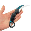 A hand holds an anime-style blue dragon rotating claw knife model with a black handle and white blade.