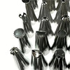A collection of 48 stainless steel piping nozzles for cake and cookie decorating, shown in black and silver tones.