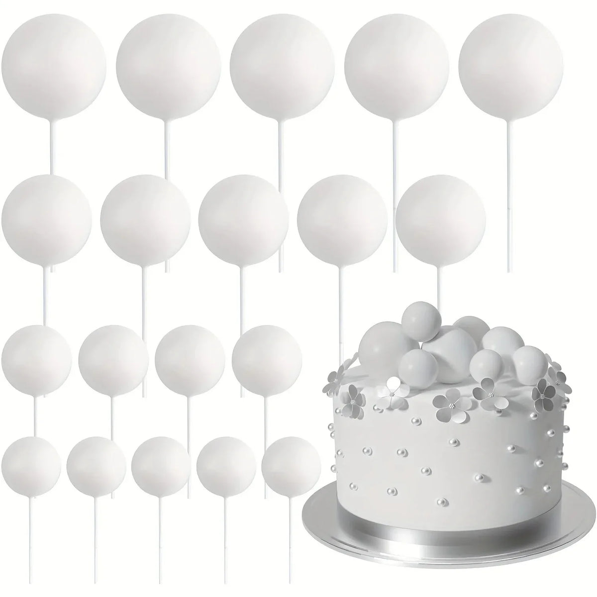 A display of twenty white foam ball cake toppers on individual sticks arranged above a silver cake plate.