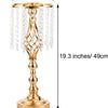 A tall gold crystal vase set featuring a tiered stand and dangling crystal strands.