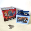 A red and black Godzilla themed resin piggy bank box with a Godzilla figure and coins.