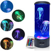 A color-changing LED fish lamp with multiple light patterns displayed on circular screens and a remote control.