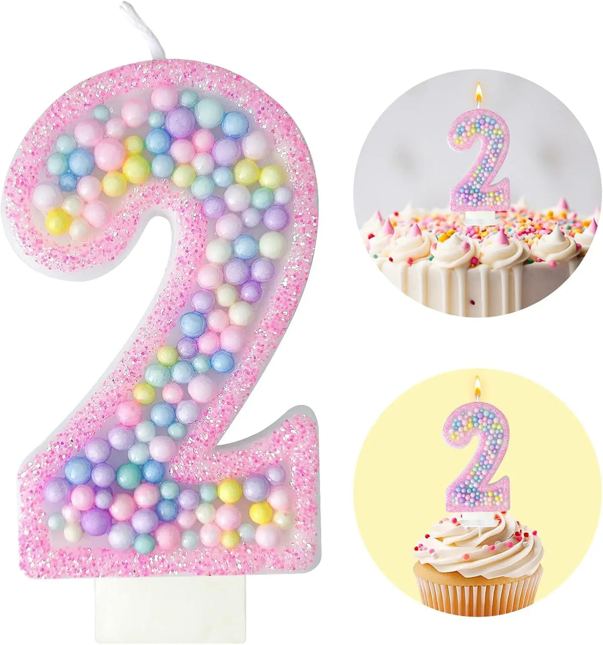 A pink glitter number 2 candle and a cupcake candle shaped like the number 2 for a birthday celebration