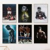 A set of five framed posters featuring black and white photographs of Muhammad Ali boxing.