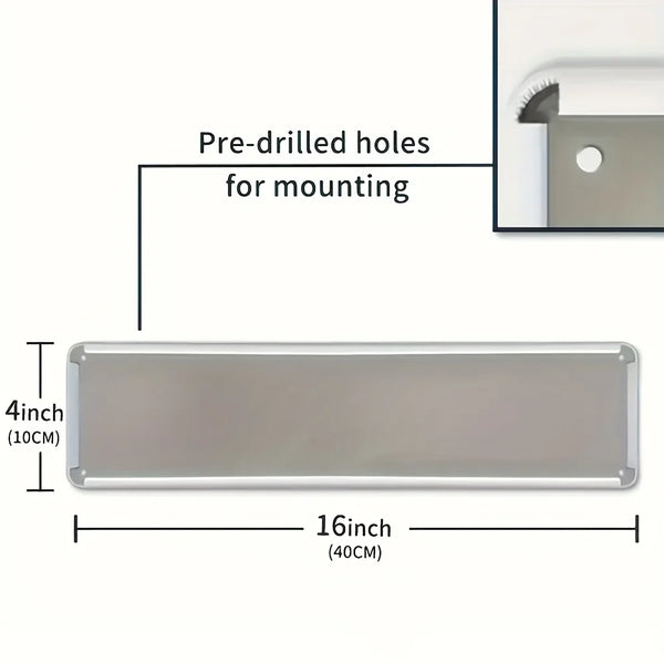 A rectangular metal wall sign with pre-drilled holes for mounting, measuring 4 inches high and 16 inches long.