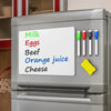 Magnetic dry erase whiteboard with food labels attached to a refrigerator