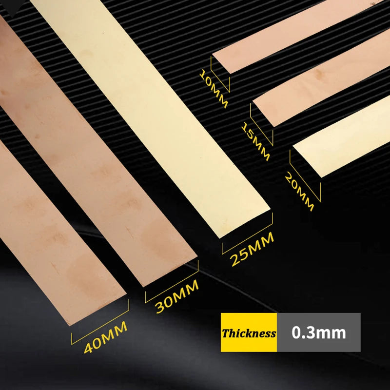 Various thicknesses of gold mirror self-adhesive stainless steel decorative wall trim pieces shown against a dark background.