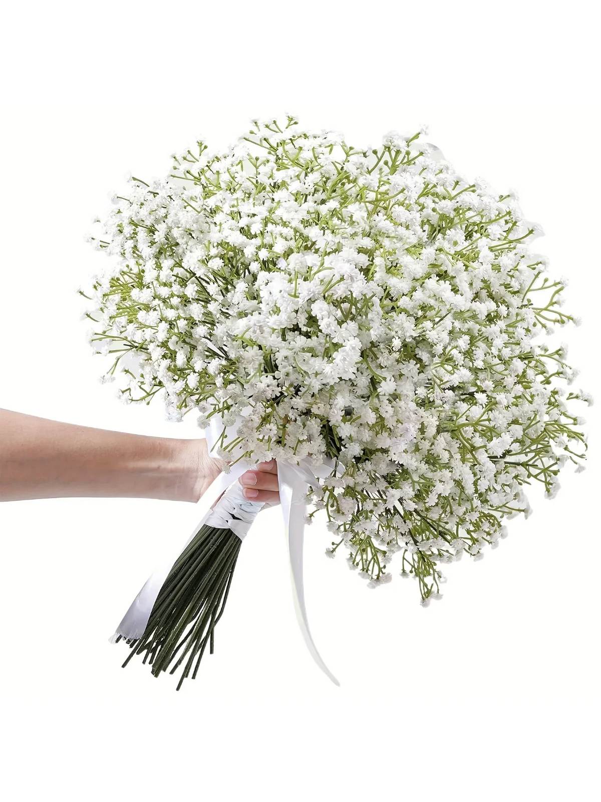A hand holds a bouquet of 90 artificial baby's breath flowers with green stems.